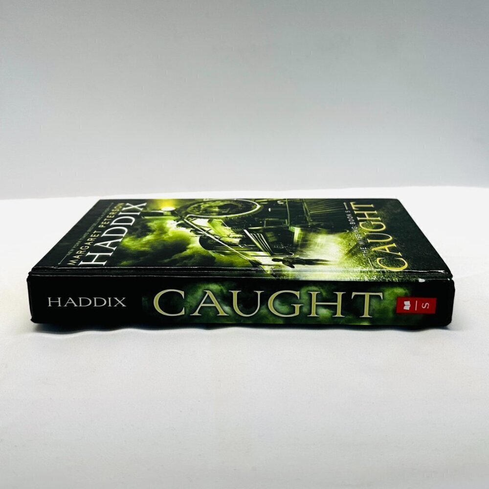 The Missing: Book 5 Caught Hardcover Book by Haddix, Margaret Peterson - Picture 5 of 7